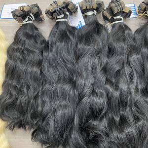 Extensiones de cabello vietnamita de la mejor calidad Extensiones de cabello con cinta ondulada natural Listo para enviar En stock disponible Sin caída de cabello - Product Image 2