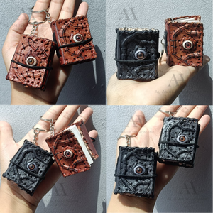 Mini porte-clés en cuir marron et noir, avec breloque œil porte-bonheur et livre de sorts, fait main en cuir véritable, cadeau - Product Image 2