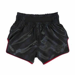 Pantalones cortos de boxeo de alta calidad diseñados para adaptarse a cada cuerpo, ayudando a los luchadores a mantener su cadera completamente en posición para golpes potentes y precisos. - Product Image 1