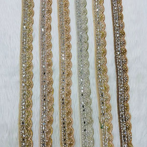 Tissu en dentelle florale brodée de sequins haut de gamme avec motifs élégants pour les mariages et les vêtements de créateurs - Product Image 1