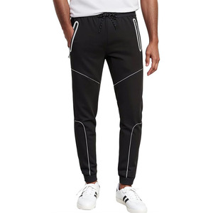 Pantalon de jogging pour homme en tricot technique extensible super confortable avec empiècements en mesh et fermeture éclair thermosoudée - Product Image 1