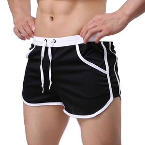 กางเกงขาสั้นออกกำลังกายของผู้ชายลายทึบผ้าแคนวาสสำหรับใส่กลางแจ้งสไตล์ลำลองย้อมสีเรียบ - Product Image 1