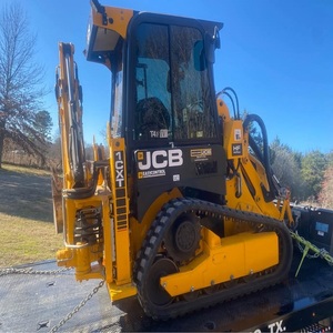 รถตักล้อยาง JCB 1CXT แบบตีนตะขาบ สีเหลือง ควบคุมง่าย ชิ้นส่วนสำคัญของเครื่องยนต์ - Product Image 1