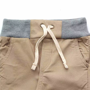 Pantalones cargo jogger para niños, pantalones de tela elástica con bolsillos, puños y cordón ajustable, pantalones cargo para niños - Product Image 4