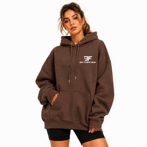 Sweat-shirt à capuche oversize pour femme en mélange de coton molletonné à manches longues, épaules tombantes, avec poches et logo frontal, idéal pour l'automne - Product Image 6