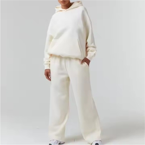 Conjunto de dos piezas para mujer: Chaqueta con capucha y cremallera de invierno con lavado ácido y pantalones de chándal de pierna ancha, cómodos, impermeables y de color liso. - Product Image 1