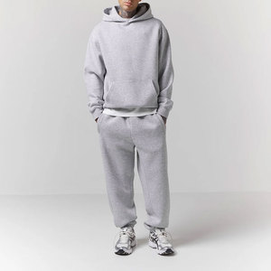 Pantalon de survêtement gris pour homme avec poches latérales, taille élastique, style décontracté, couleur unie, 100% coton, tissu respirant de poids moyen - Product Image 1