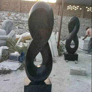 Escultura Abstracta Moderna de Mármol Blanco Tallada a Mano con Acabado Pulido para Decoración del Hogar para las Ocasiones de Pascua y Diwali - Product Image 1