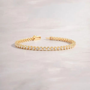 Bracelet tennis en or jaune pour femme, diamants ronds taille brillant sertis clos, classique pour le quotidien - Product Image 1