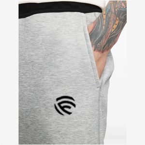 Pantalones deportivos con paneles de tejido Tech Fleece - Product Image 4