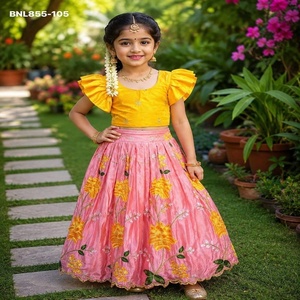 Pattu-Pavadai para niña en color rosa claro brillante con bordado floral y mangas con volantes en amarillo, a precio de mayoreo. - Product Image 1