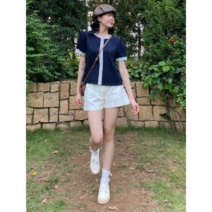 เสื้อยืดลำลองผู้หญิงทรงเข้ารูป Low Moq ผลิตจากวัสดุรักษ์โลก ดีไซน์ใหม่ ติดกระดุม ผลิตในเวียดนาม เนื้อผ้าธรรมชาติ สีพื้น มีตัวอย่างให้ทดลองฟรี - Product Image 3