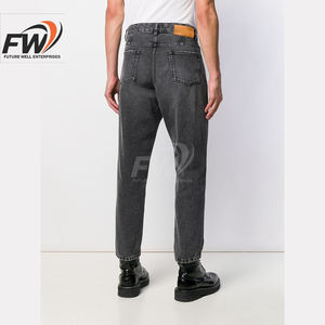 กางเกงยีนส์เดนิมคุณภาพสูงสำหรับผู้ชาย แบบขายส่ง OEM ปรับแต่งได้ แฟชั่นสไตล์ขาดๆ ทรงตรงแบบซ้อนกัน สีสโตนวอช สำหรับทำงาน - Product Image 4