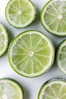 Hoge kwaliteit Vietnamese diepvries limoenplakjes, fabrieksprijs, premium citrusvruchten voor export en foodservice