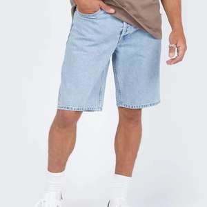 Shorts amples pour hommes de qualité supérieure, délavés à l'acide, respirants, avec poches latérales, pour le fitness et les activités de plein air, vente en gros - Product Image 5