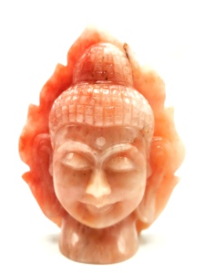 Cabeza de Buda de Aventurina Naranja sobre hoja - talla artesanal del Buda sereno y meditando - Product Image 1