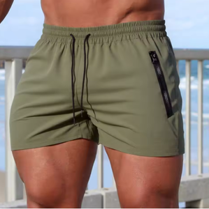Shorts de bain pour hommes, couleur unie, décontractés, pour la plage, séchage rapide, pour la course à pied, la remise en forme, la salle de sport, avec poche zippée - Product Image 1