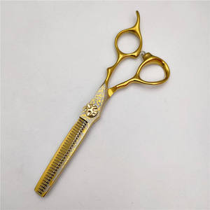 กรรไกรตัดผมมืออาชีพสแตนเลสญี่ปุ่นเคลือบทองคำ รับทำโลโก้ขายส่ง - Product Image 2