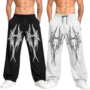 Pantalon de survêtement ample noir et blanc pour homme, en coton, coupe oversize, imprimé tribal, style streetwear, avec taille élastique et cordon de serrage - Product Image 5
