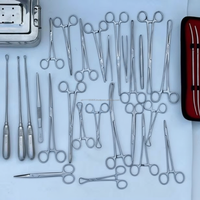 Ensemble de 35 instruments chirurgicaux de dilatation et curettage gynécologique, curette
