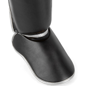 Protège-tibias en cuir PU noir avec fermeture auto-agrippante pour la protection sportive des adultes, design léger - Product Image 6