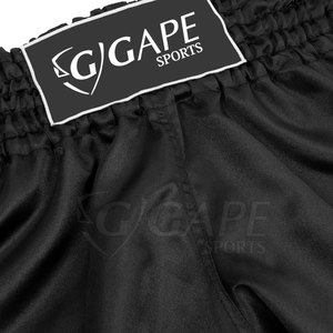 Shorts de Muay Thai unisexes pour l'entraînement professionnel, impression personnalisée sur le devant, 100% polyester, séchage rapide, légers, service OEM - Product Image 3