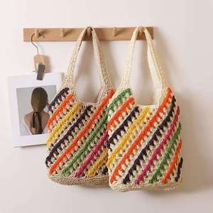 Ilumina tus días soleados con este vibrante bolso de hilo natural con coloridas rayas diagonales de crochet y asas cómodas. - Product Image 2