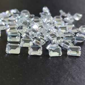 โทแพซสีขาวธรรมชาติทรงแปดเหลี่ยมเจียระไนแบบเหลี่ยมเพชรพลอย  ขนาดมาตรฐาน  พร้อมใบรับรอง  ไม่ผ่านการปรับแต่ง  พร้อมสำหรับการฝังในเครื่องประดับ - Product Image 5