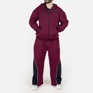 Ensemble de survêtement pour homme, coupe oversize et ample, en molleton technique, avec sweat à capuche à empiècements color block et pantalon jogger à jambe large, style streetwear et sport. - Product Image 2