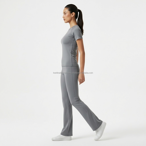 ชุดออกกำลังกายขายส่งพร้อมโลโก้สั่งทำ เสื้อโยคะแขนสั้นทรงเข้ารูปสำหรับผู้หญิง และกางเกงโยคะขาบาน ชุด 2 ชิ้น ระบายอากาศได้ดี - Product Image 6