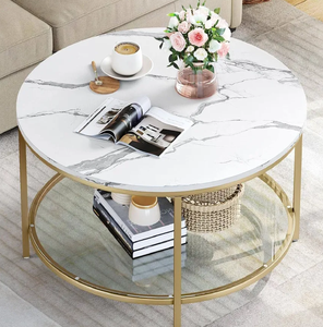 Mesa redonda de dos niveles con una superficie superior blanca y una base de mármol gris con postes de metal plateado, a precios de mayorista. - Product Image 5