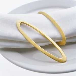 Anillos de servilleta ovalados de metal dorado moderno, decoración de mesa con acabado pulido, decoración de mesa duradera y ecológica. - Product Image 1