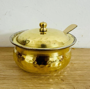 Brilliant hammered brass container filled with fresh ghee, including a knob <b>lid</b>; available at wholesale price. - Product Image 2