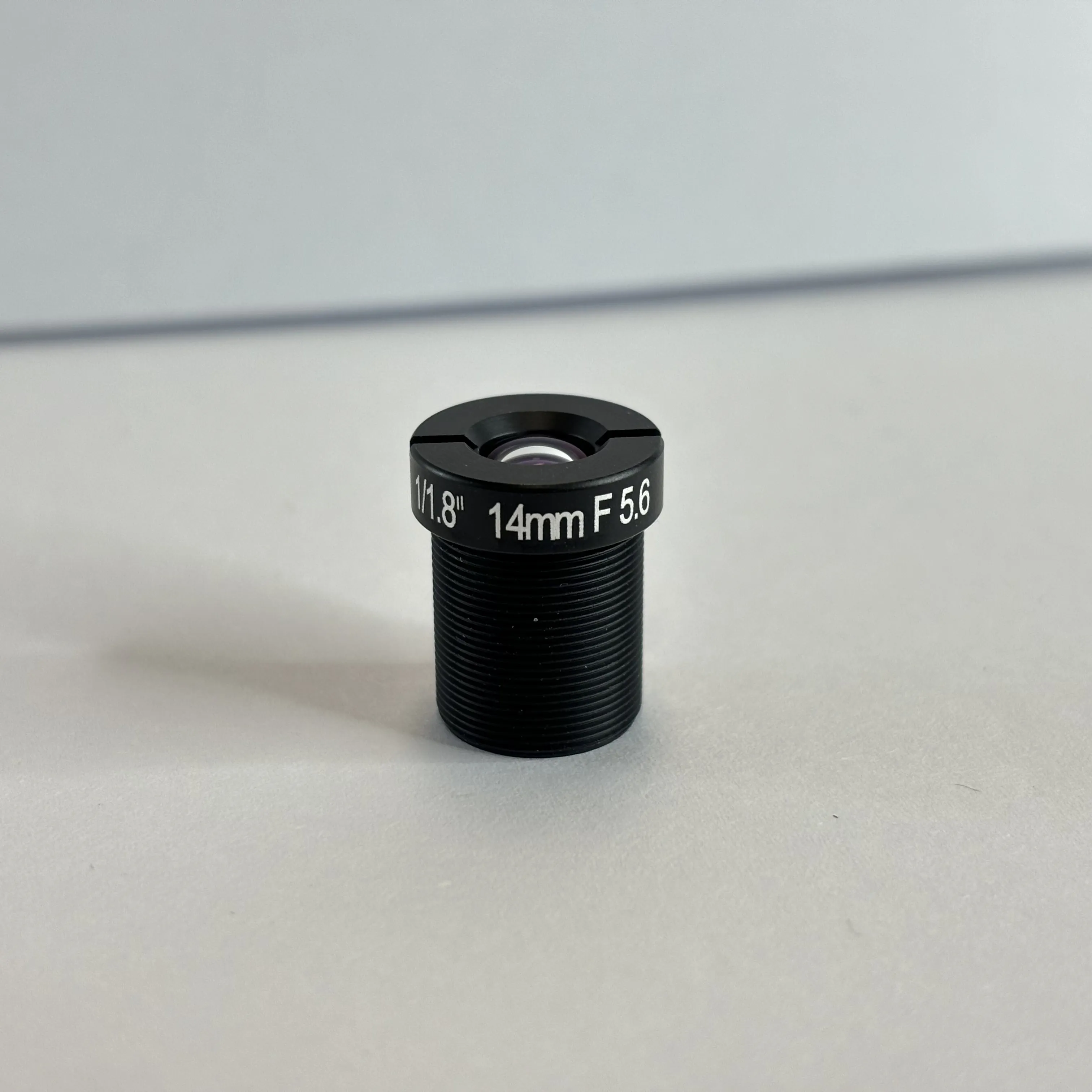 FRANKFURT OPTATEC EXHIBITOR 1/1.8" sensor 10MP Resolution F/5.6 14mm EFL M12 Mount Lens With IR Filter