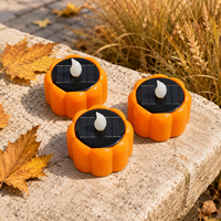 Bougie LED sans flamme à énergie solaire en forme de citrouille d'Halloween avec effet de flamme vacillante pour la décoration extérieure de jardin, de patio et de table de fête