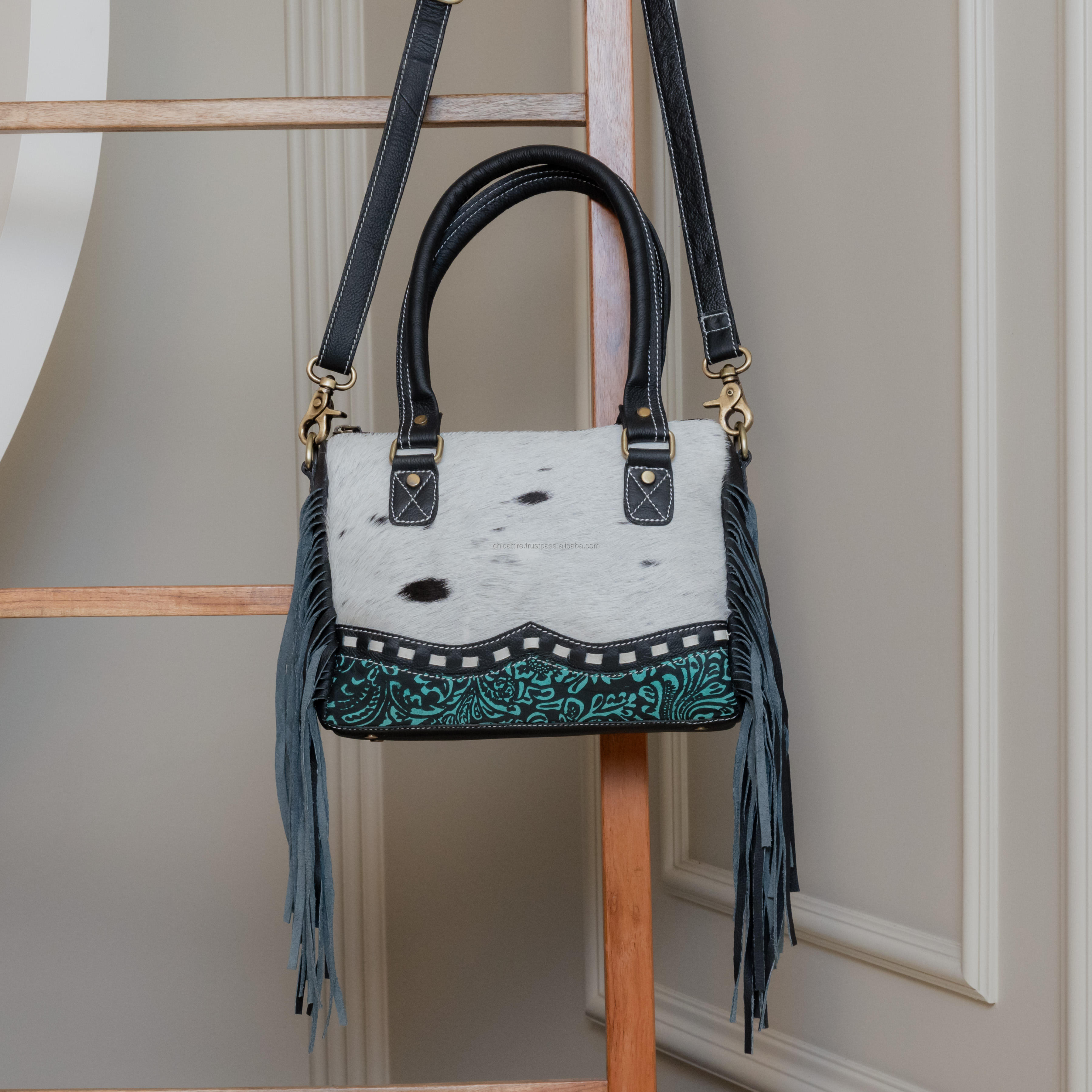 White with Turquoise Tooling