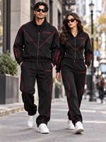 Ensemble survêtement homme Sam.Tactical noir avec veste à capuche zippée et pantalon, surpiqûres rouges, style streetwear, coupe classique, pour l'automne
