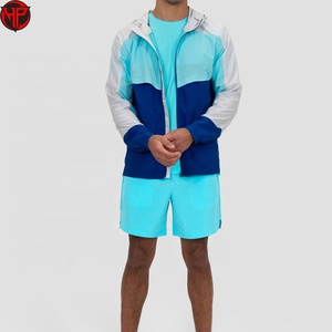 ชุดเซ็ตเสื้อแจ็คเก็ตและกางเกงขาสั้นไนลอนแบบซิป Unisex ขายส่ง ชุดลำลองสำหรับผู้ชายใส่เล่นกีฬาวิ่งในฤดูร้อน ชุดเซ็ตเสื้อแจ็คเก็ตและกางเกงขาสั้นสีตัดต่อ - Product Image 1