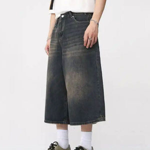 Shorts en jean longs et amples style streetwear déchiré pour hommes et femmes, coupe oversize, délavage intense - Product Image 3