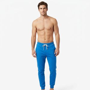 Pantalones deportivos azules para hombre, cintura elástica con cordón, pantalones jogger con puños, peso medio, transpirables, casuales, deportivos, hechos en Bangladesh. - Product Image 1