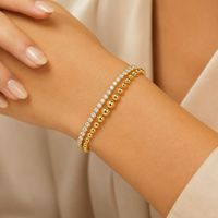 Bracelet double couche en acier inoxydable plaqué or 18 carats avec chaîne tennis en zircon cubique pour femme