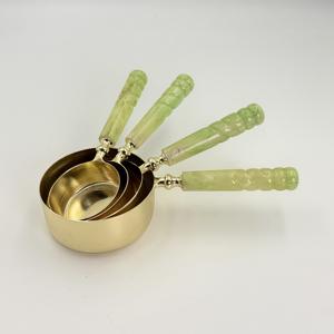 Nueva Taza Medidora de Acero Inoxidable Resistente al Calor y Ecológica, con Asa de Resina Dorada, Capacidad de 240 ml, para Hogar, Cocina y Hotel - Product Image 1