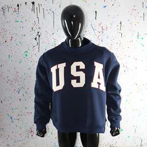 Sudadera USA BLUE con cuello ancho, 100% blanca, con apliques bordados y hilos finos. - Product Image 1