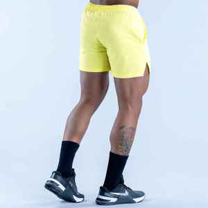 Shorts décontractés tricotés pour hommes, jaunes, couleur unie, taille élastique, avec poches, séchage rapide, taille mi-haute, OEM ODM personnalisé - Product Image 3