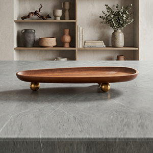 Elegante bandeja ovalada de madera con una textura suave y rica, elevada sobre elegantes patas esféricas de metal, ideal para la decoración del hogar. - Product Image 4