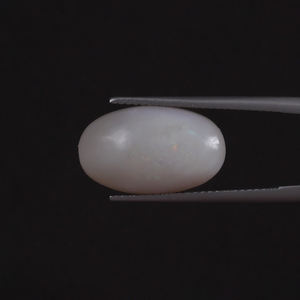Ópalo Natural Blanco Certificado por IGI, Gema Suelta de 7.25 Quilates, Corte Ovalado 18x11mm, Tallado a Mano, Pulido, Tratado con Cera/Aceite, Buen Estado - Product Image 1