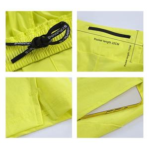 กางเกงขาสั้นกีฬาผู้ชายผ้าไหมน้ำแข็ง ระบายอากาศ แห้งเร็ว มีซิป กระเป๋าหลายช่อง สำหรับฤดูร้อน ขายส่งจากโรงงาน - Product Image 2