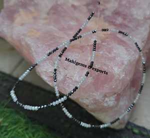 ลูกปัดมอยส์ซาไนต์สีขาวขนาด 2.50 มม. และสีดำขนาด 2 มม. คุณภาพ AAA สำหรับทำเครื่องประดับ - Product Image 1