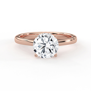 Bague de fiançailles solitaire ronde intemporelle en or jaune poli à quatre griffes, bijoux fins minimalistes - Product Image 1