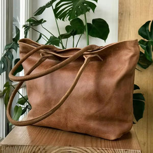 กระเป๋าโท้ทหนังแท้เอนกประสงค์ ขนาดมาตรฐาน ความจุเยอะ สะพายไหล่เดียว ปิดซิป ใช้ได้ทุกวัน รุ่น LTB-0290 - Product Image 1